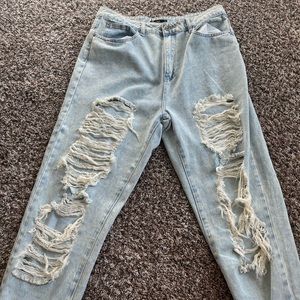 MISSGUIDED ripped light wash mom jeans